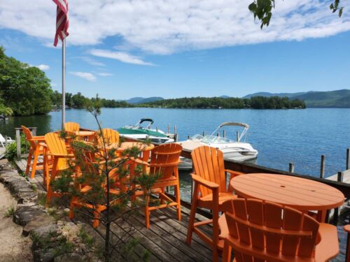 Tables and Chairs on deck overlooking lake